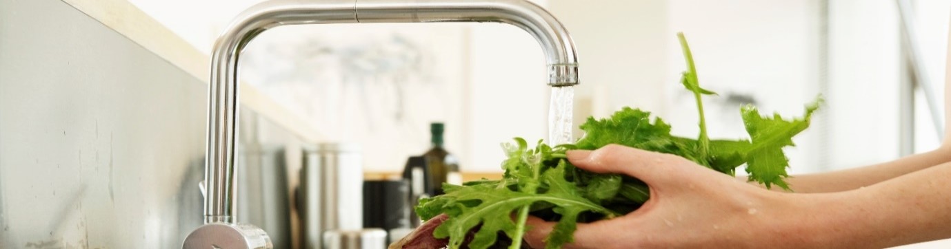 Washing rocket under a tap