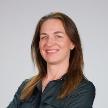 Tegan Tembe wearing dark suit